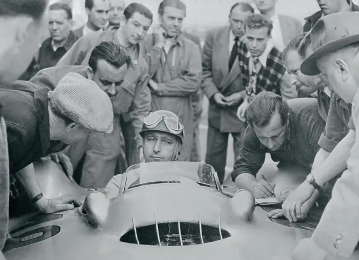 Framed Print : Newsmen and Mechanics Surround Driver Juan Manuel Fangio Framed Print : Newsmen and Mechanics Surround Driver Juan Manuel Fangio