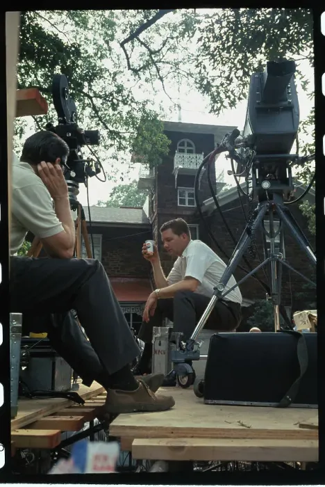 Framed Print : Newsmen Sitting By Their Equipment Framed Print : Newsmen Sitting By Their Equipment