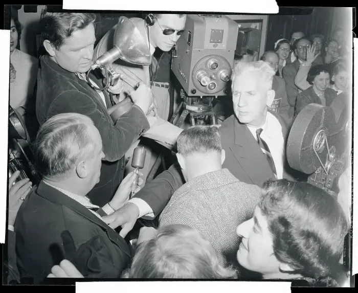 Framed Print : Newsmen Surrounding Paul Douglas Framed Print : Newsmen Surrounding Paul Douglas