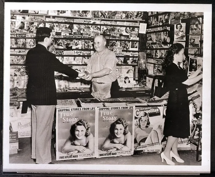 Framed Print : Newsstand Operator Taking Money / Customer Framed Print : Newsstand Operator Taking Money / Customer