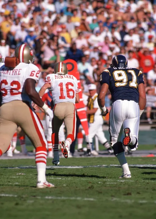 Framed Print : NFL San Francisco 49ers - QB # 16 Joe Montana, RD # 62 Guy McIntyre and S.D. Charger DE # 91 Leslie O'Neal Framed Print : NFL San Francisco 49ers - QB # 16 Joe Montana, RD # 62 Guy McIntyre and S.D. Charger DE # 91 Leslie O'Neal