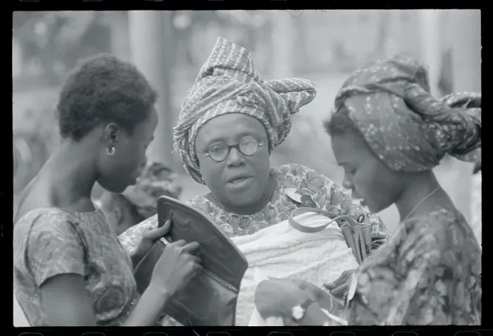 Framed Print : Nigerian Woman Placing Bets Framed Print : Nigerian Woman Placing Bets