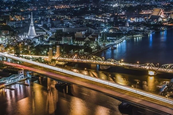 Night view of bridge crossing Chaophraya river