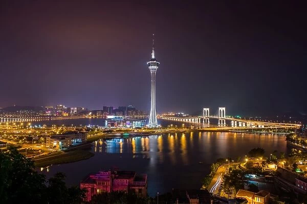Macau. Night view of Macau tower from Penya hill