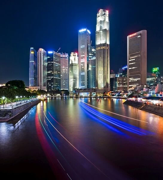 Night view of Singapore city from boat Quay