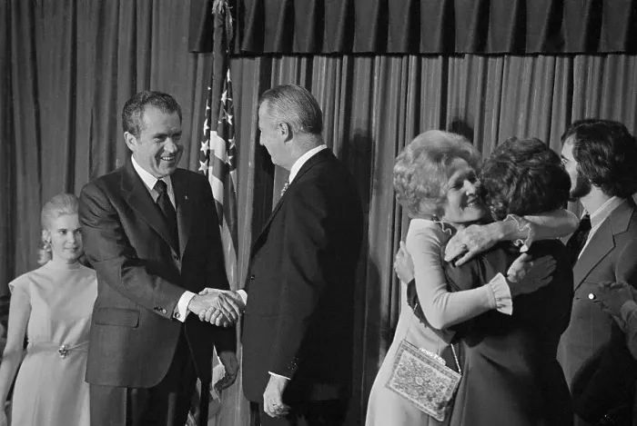 Framed Print : Nixon and Agnew Shaking Hands While Wives Hugging Framed Print : Nixon and Agnew Shaking Hands While Wives Hugging