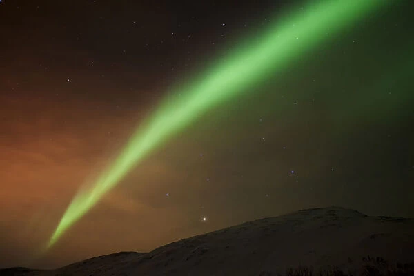 Northern Lights over the Kattfjord pass in winter, Kvaloya, Tromso, Norway, Europe