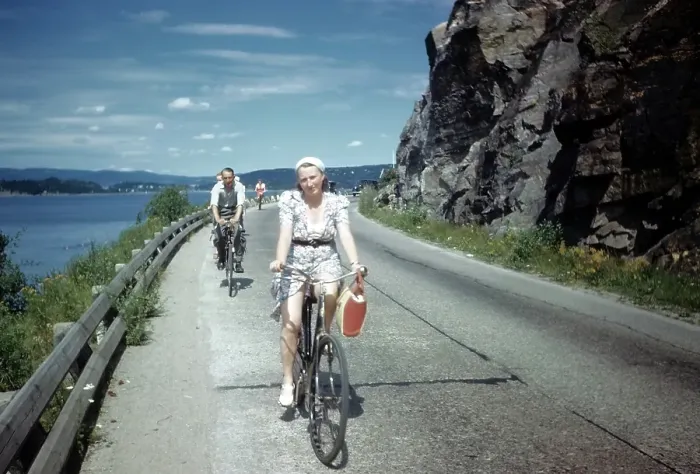 Framed Print : NORWAY - JULY 1946: A view as a couple rides their bike in Norway Framed Print : NORWAY - JULY 1946: A view as a couple rides their bike in Norway