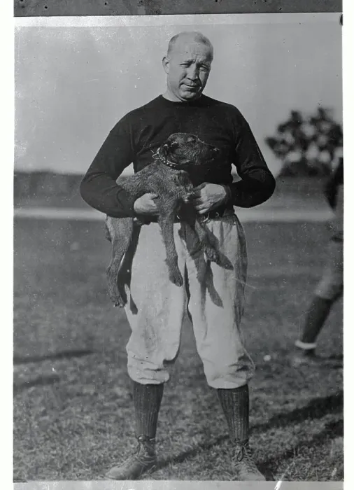 Framed Print : Notre Dame Coach Knute Rockne Holding Dog Framed Print : Notre Dame Coach Knute Rockne Holding Dog