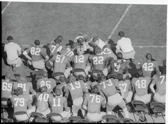 Framed Print : Notre Dame Players Crowding Around Terry Brennan