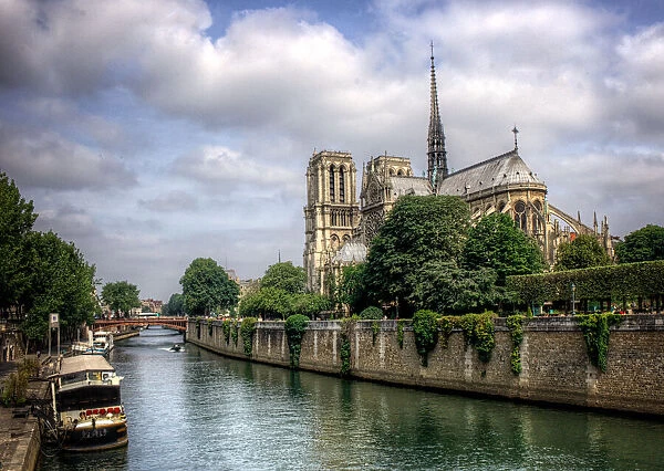 Notre Dame against the Seine River, Paris France