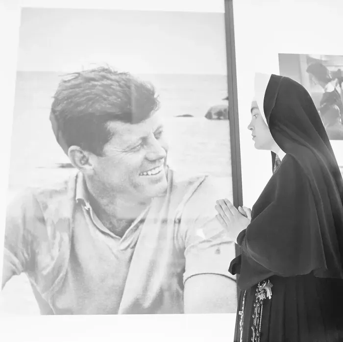 Framed Print : Nun Praying Beside Photo of John F. Kennedy Framed Print : Nun Praying Beside Photo of John F. Kennedy