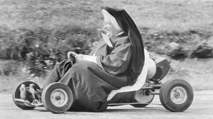 Framed Print : Nun Races Go-Cart