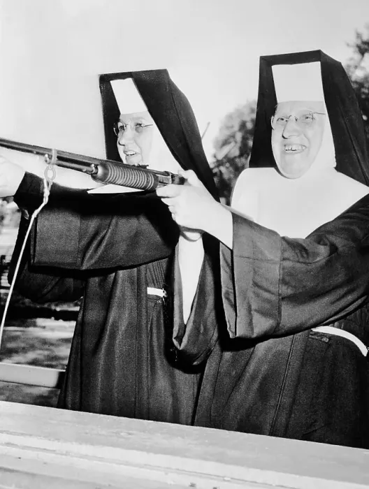 Framed Print : Nuns Playing at Amusement Park Framed Print : Nuns Playing at Amusement Park