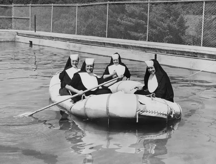 Framed Print : Nuns Rafting on Water Framed Print : Nuns Rafting on Water