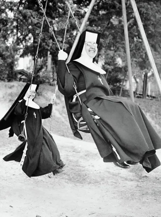 Framed Print : Nuns Swinging on Swing Set Framed Print : Nuns Swinging on Swing Set