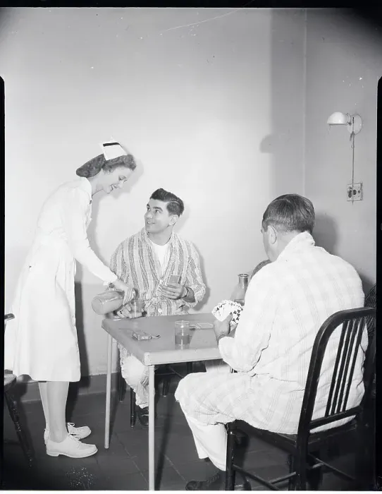 Framed Print : Nurse Attending Card-Playing Patients Framed Print : Nurse Attending Card-Playing Patients