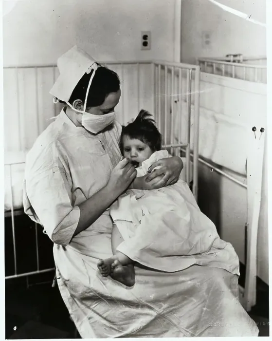 Framed Print : Nurse Feeding Child with Sleeping Sickness Framed Print : Nurse Feeding Child with Sleeping Sickness