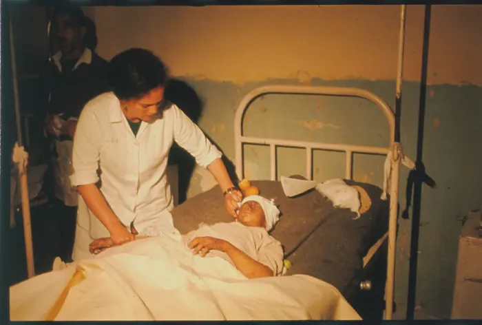 Framed Print : Nurse with Injured Egyptian Child Framed Print : Nurse with Injured Egyptian Child