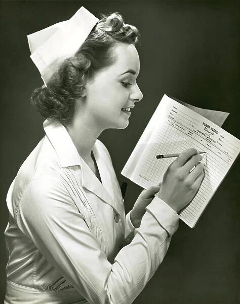 Nurse with patients medical chart