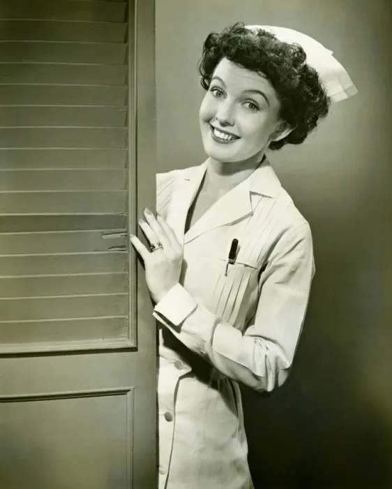Framed Print : Nurse peeping trough opened doors, (B&W) Framed Print : Nurse peeping trough opened doors, (B&W)