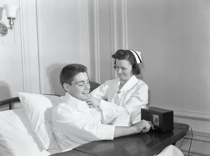 Framed Print : Nurse Prepping Hospitalized Man with a Radio Framed Print : Nurse Prepping Hospitalized Man with a Radio