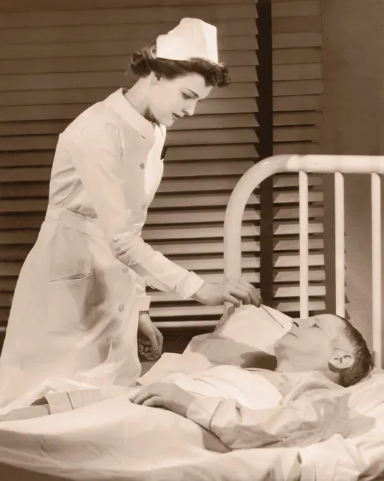 Framed Print : Nurse taking male patients temperature (B&W sepia tone)