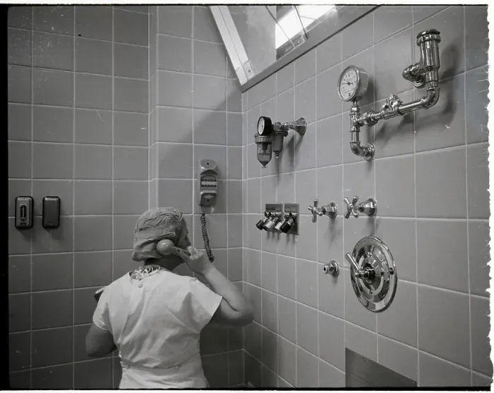 Framed Print : Nurse Using Hospital Intercom Framed Print : Nurse Using Hospital Intercom