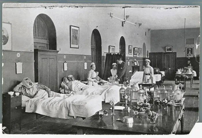 Framed Print : Nurses Attending to Patients Framed Print : Nurses Attending to Patients