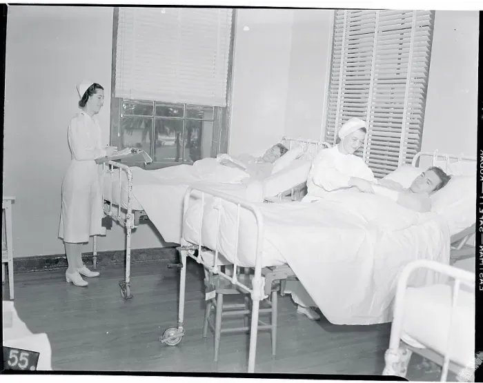 Framed Print : Nurses Louise Sell and Dolores Hernandez In Hospital Room with Patients Framed Print : Nurses Louise Sell and Dolores Hernandez In Hospital Room with Patients
