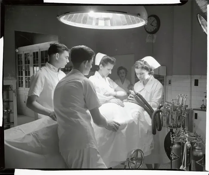 Framed Print : Nurses and Soldiers Preparing Patient for Operation Framed Print : Nurses and Soldiers Preparing Patient for Operation