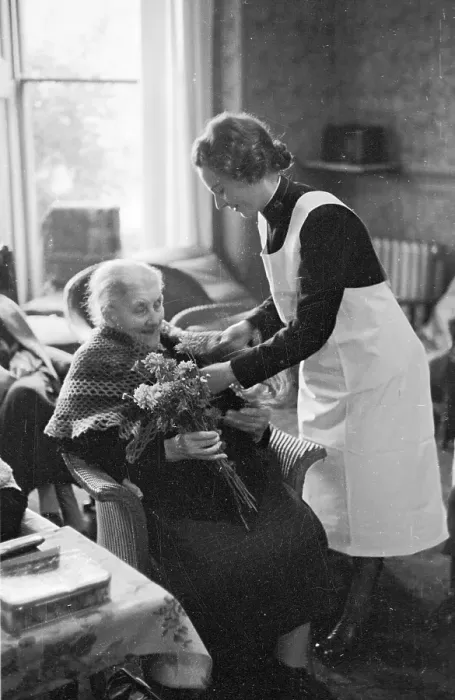 Framed Print : Nursing. 20th December 1947: A Salvation Army volunteer nurses an old woman Framed Print : Nursing. 20th December 1947: A Salvation Army volunteer nurses an old woman