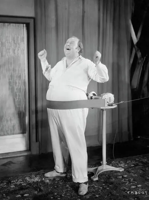 Framed Print : Obese Man Singing While Belly is Massaged