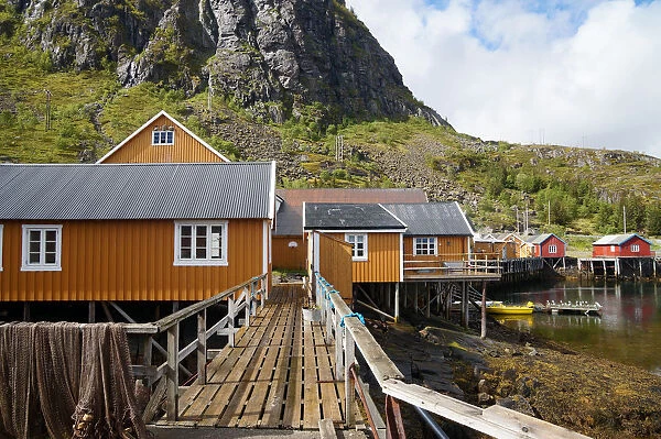 Ochre coloured fishermans huts on the Lofoten Isl
