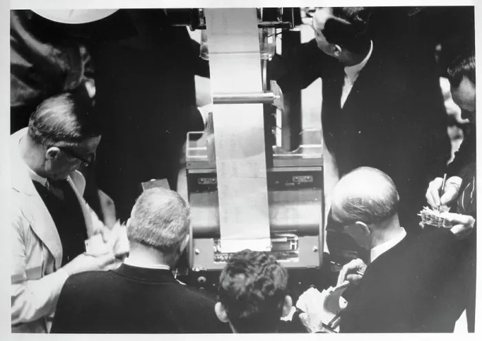 Framed Print : Odd-Lot Dealers Getting Prices from Printer Framed Print : Odd-Lot Dealers Getting Prices from Printer