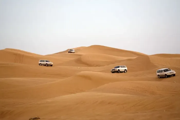 Framed Print : Off-road Vehicles Navigating Down a Sand Dune. Hatta, United Arab Emirates Framed Print : Off-road Vehicles Navigating Down a Sand Dune. Hatta, United Arab Emirates