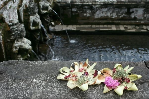 Offerings by the sacred pool