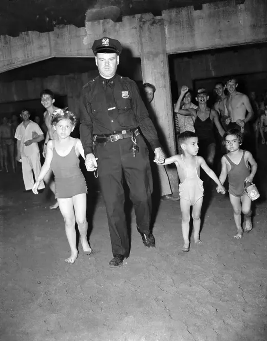 Framed Print : Officer Leads Three Children at Coney Island Framed Print : Officer Leads Three Children at Coney Island
