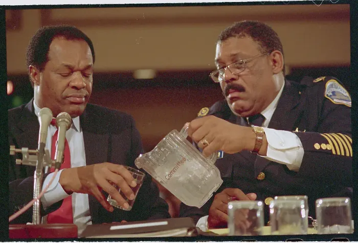 Framed Print : Officer Pouring Water for Marion Barry Framed Print : Officer Pouring Water for Marion Barry