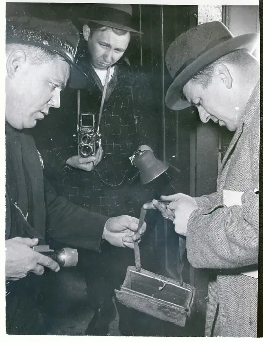 Framed Print : Officers Examining Handbag Framed Print : Officers Examining Handbag