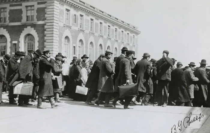 Framed Print : Officials Guiding Immigrants Framed Print : Officials Guiding Immigrants