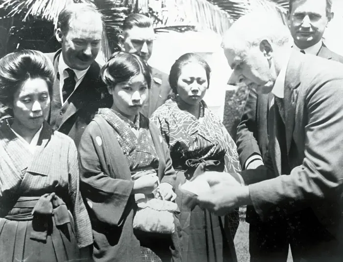 Framed Print : Officials Looking over Passports of Japanese Brides Framed Print : Officials Looking over Passports of Japanese Brides