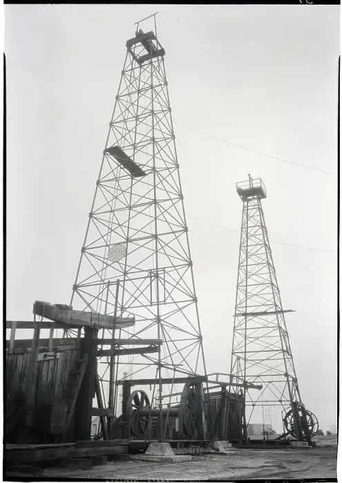 Framed Print : Two Oil Derricks And Pumping Rigs Framed Print : Two Oil Derricks And Pumping Rigs