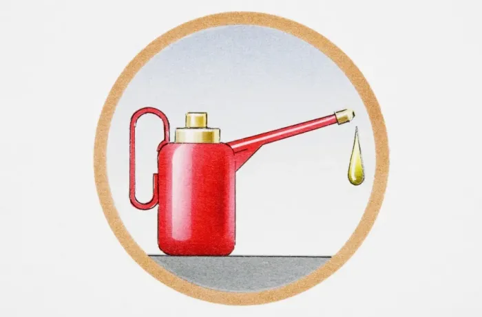 Framed Print : Oil can with drip falling from spout Framed Print : Oil can with drip falling from spout