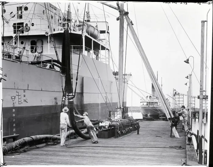 Framed Print : Oil Tanker Being Loaded from Large Hoses Framed Print : Oil Tanker Being Loaded from Large Hoses