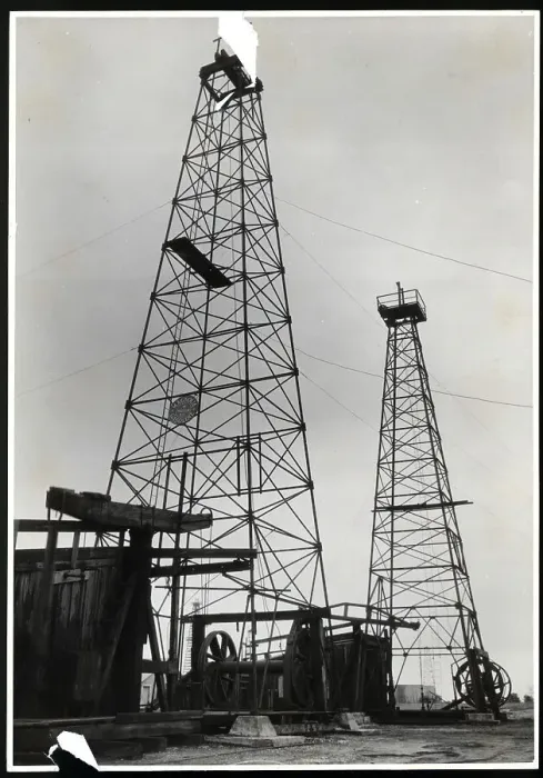 Framed Print : Oil Wells. (Original Caption). Oklahoma: Oil wells showing pumping. Undated photograph Framed Print : Oil Wells. (Original Caption). Oklahoma: Oil wells showing pumping. Undated photograph