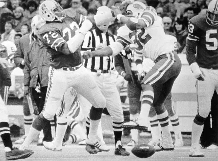 Framed Print : O.J. Simpson Fights with a New England Patriot on the Field Framed Print : O.J. Simpson Fights with a New England Patriot on the Field