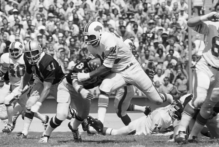 Framed Print : O.J. Simpson Gets Tackled by Gerald Irons