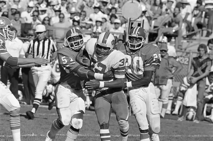 Framed Print : O.J. Simpson Held by Denver Broncos Tacklers Framed Print : O.J. Simpson Held by Denver Broncos Tacklers