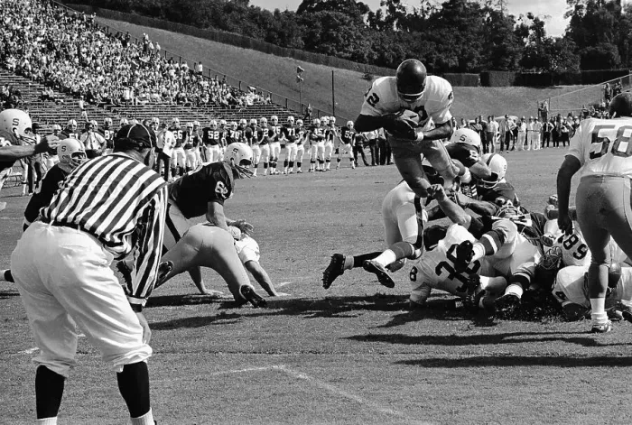 Framed Print : O.J. Simpson Jumps Over Stanford Defensive Line Framed Print : O.J. Simpson Jumps Over Stanford Defensive Line